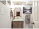 Updated bathroom featuring wood vanity with new countertops and modern fixtures at 170 Dover Ct, Castle Pines, CO 80108