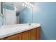 Bathroom with large countertop and mirror at 8707 E Florida Ave # 614, Denver, CO 80247