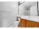 Bathroom with a single sink and large mirror at 8707 E Florida Ave # 614, Denver, CO 80247
