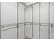 Spacious walk-in closet with multiple levels of wire shelving for maximum storage at 8707 E Florida Ave # 614, Denver, CO 80247
