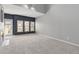 Bright and airy living room with a fireplace, large windows, and access to outdoor space at 8707 E Florida Ave # 614, Denver, CO 80247