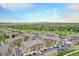 Aerial view of community featuring lush green lawns and easy access parking at 1425 Blue Sky Cir # 15-301, Erie, CO 80516