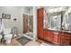 Bathroom featuring glass enclosed shower, modern vanity, and tile flooring at 1425 Blue Sky Cir # 15-301, Erie, CO 80516
