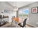 Charming dining area with a view, perfect for enjoying meals and entertaining guests at 1425 Blue Sky Cir # 15-301, Erie, CO 80516