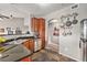 Well-equipped kitchen with stainless steel appliances, granite countertops, and ample storage space at 1425 Blue Sky Cir # 15-301, Erie, CO 80516