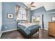 Serene main bedroom with large windows and private access to the outdoor patio at 1425 Blue Sky Cir # 15-301, Erie, CO 80516