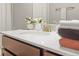 Close up of a clean bathroom counter with a decorative flower at 2225 Santini Trl # C, Littleton, CO 80129