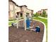 Outdoor workout area with modern exercise equipment and mulch surface at 2225 Santini Trl # C, Littleton, CO 80129