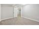 Neutral bedroom has carpet flooring, white walls, and trim at 8773 S Dudley St, Littleton, CO 80128