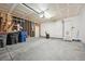 Spacious garage with concrete floors and good lighting at 8773 S Dudley St, Littleton, CO 80128