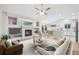 Staged living room with bright, open layout and inviting furniture arrangement at 8773 S Dudley St, Littleton, CO 80128