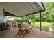Covered patio with outdoor seating, perfect for entertaining or relaxing at 3231 S Elati St, Englewood, CO 80110