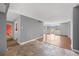 Living room with tile and hardwood flooring, neutral walls, and expansive windows for lots of natural light at 1250 N Humboldt St # 202, Denver, CO 80218