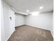 Finished basement featuring neutral carpeting, paneled walls, and recessed lighting at 1054 Magnolia St, Denver, CO 80220