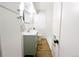 Bathroom featuring new vanity, with tub and white subway tile at 1054 Magnolia St, Denver, CO 80220