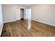 Bedroom featuring wood floors, a closet, and base board heaters at 1054 Magnolia St, Denver, CO 80220