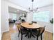 Cozy dining area featuring a round table and view to the living room at 1054 Magnolia St, Denver, CO 80220