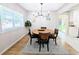 Dining room with a stylish chandelier and a wooden table at 1054 Magnolia St, Denver, CO 80220