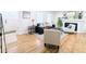 Living room with hardwood floors and a decorative fireplace at 1054 Magnolia St, Denver, CO 80220