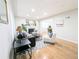Bright living room featuring a fireplace, hardwood floors, and stylish decor at 1054 Magnolia St, Denver, CO 80220