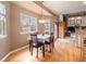 Dining area with natural light and neutral paint at 11910 W 83Rd Pl, Arvada, CO 80005