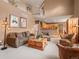Spacious living room with fireplace, and open floor plan at 11910 W 83Rd Pl, Arvada, CO 80005