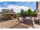 This large backyard offers lots of space and includes an outdoor dining and seating area at 3730 Lowell Blvd, Denver, CO 80211