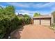 This property includes a detached two-car garage and a large parking area at 3730 Lowell Blvd, Denver, CO 80211