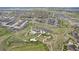 Aerial view of community clubhouse, amenities, and surrounding neighborhood at 2188 Abigail Ln, Castle Rock, CO 80104