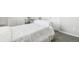 Bedroom featuring white bedding and gray carpeting in a neutral color palette at 2188 Abigail Ln, Castle Rock, CO 80104