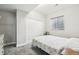 Bright bedroom features large closet, neutral paint, and cozy carpeted floors at 2188 Abigail Ln, Castle Rock, CO 80104