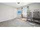 Bedroom featuring a reptile enclosure, bird cage, and neutral-toned walls at 2188 Abigail Ln, Castle Rock, CO 80104