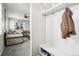 Inviting foyer with a bench and hooks for organization, seamlessly flowing into the living area at 2188 Abigail Ln, Castle Rock, CO 80104