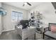 Home office with desk, shelves, and ceiling fan at 2188 Abigail Ln, Castle Rock, CO 80104