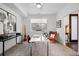 Bright home office with modern desk, chair, and large window at 3038 Wilson Ct # 3, Denver, CO 80205