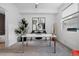 Modern home office features a white desk, window, and stylish decor at 3038 Wilson Ct # 3, Denver, CO 80205