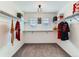 Spacious walk-in closet offering ample storage with built-in shelving and rods at 11657 Olathe St, Commerce City, CO 80022