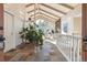 Bright foyer with vaulted ceilings, striking slate floors and a glimpse of the living room at 12493 Forest Canyon Dr, Parker, CO 80138