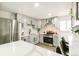 Modern kitchen features stainless steel appliances, sleek gray cabinets, and a stylish subway tile backsplash at 315 S Xapary St, Aurora, CO 80012