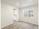 Dining area with a window and view to an adjacent kitchen at 6156 Hourglass Dr, Brighton, CO 80601