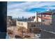 City views and a school visible from the property at 903 E 13Th Ave, Denver, CO 80218