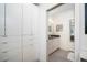 Modern bathroom with double vanity and a walk-in shower at 903 E 13Th Ave, Denver, CO 80218