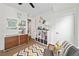 bedroom with built-in shelving and mid-century modern dresser at 903 E 13Th Ave, Denver, CO 80218