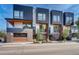 Modern three-unit townhome development with sleek design and private entrances at 903 E 13Th Ave, Denver, CO 80218