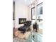 Living room with a modern fireplace and Eames Lounge Chair at 903 E 13Th Ave, Denver, CO 80218