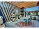 Spacious rooftop deck with pergola, dining area, and grill at 903 E 13Th Ave, Denver, CO 80218