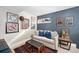 Cozy sitting area with a sofa and eclectic decor at 903 E 13Th Ave, Denver, CO 80218