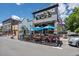Charming Waterloo exterior featuring outdoor seating and vibrant blue umbrellas for a delightful dining experience at 272 Lafayette St, Louisville, CO 80027