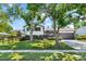 Charming two-story home with a well-maintained lawn and mature trees at 272 Lafayette St, Louisville, CO 80027