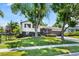 Charming two-story home with a well-maintained lawn and mature trees at 272 Lafayette St, Louisville, CO 80027